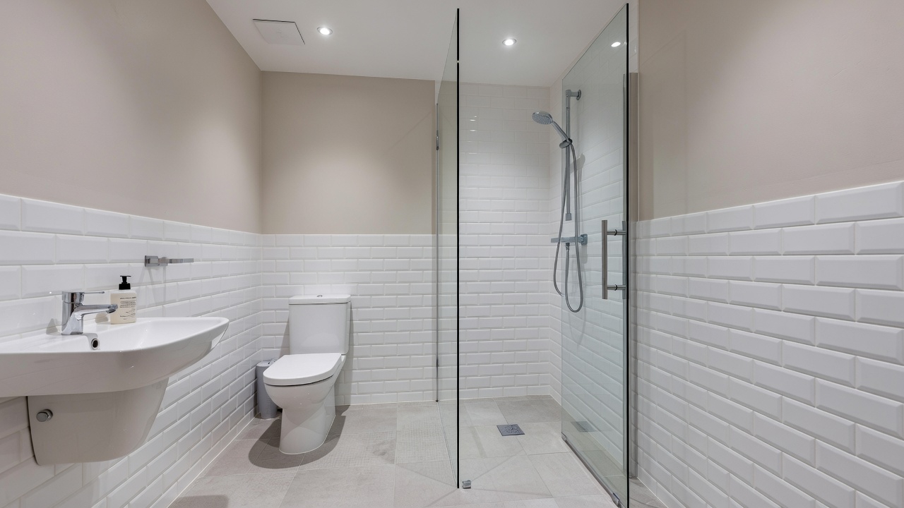 Luxury wet room with walk-in rainfall shower in a UK home